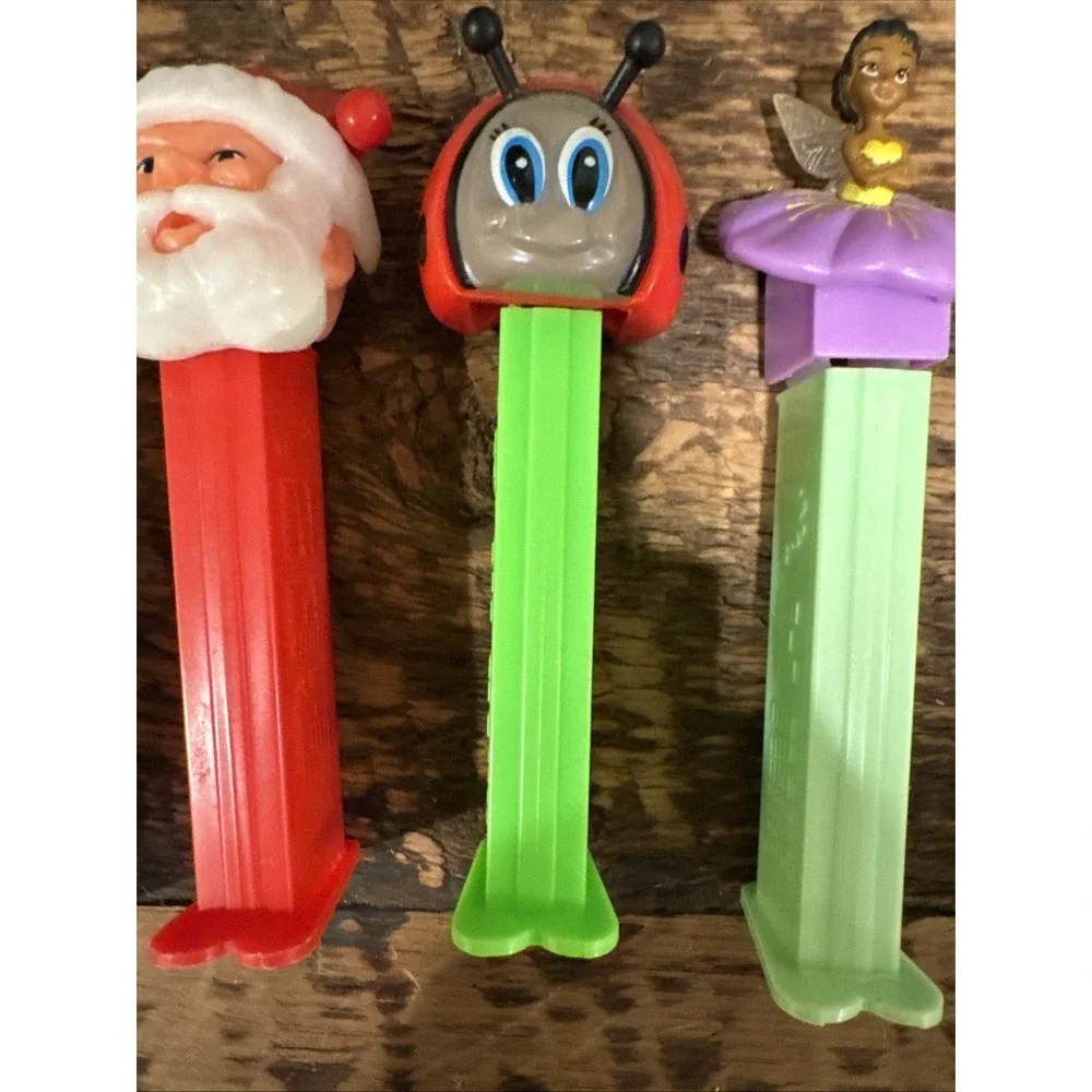 6 VINTAGE PEZ DISPENSERS Hello kitty, Homer Simpson, Santa, Etc